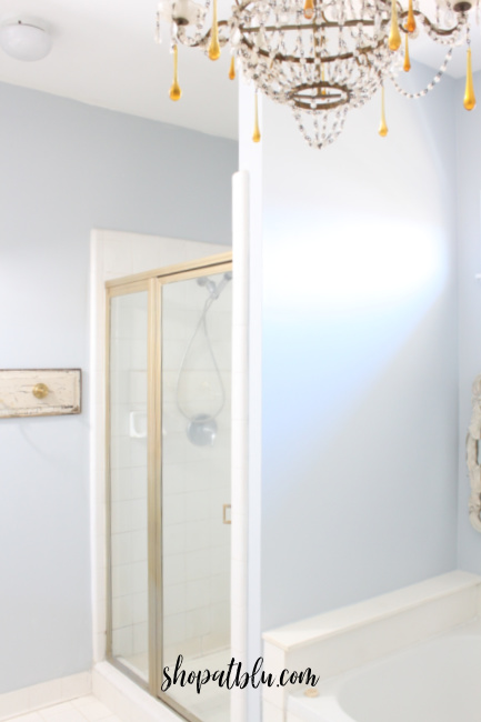 The Blue Building Anitques Shopatblu spray painted shower doors gold accents