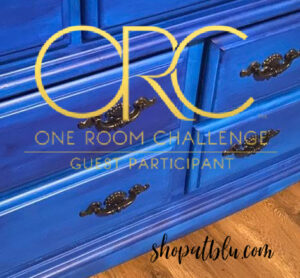 the blue building antiques shop at blu week 7 orc logo