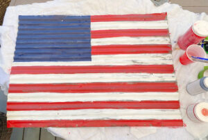 The Blue Building Antiques Shopatblu barn metal flag white stripes