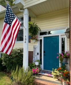 Shopatblu The Blue Building Antiques decorate with patriotic red white and blue entry flag