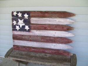 The Blue Building Antiques Shopatblu fence post flag
