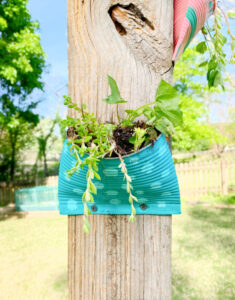 Shopatblu Earth Day crushed tin can pocket recycle bin