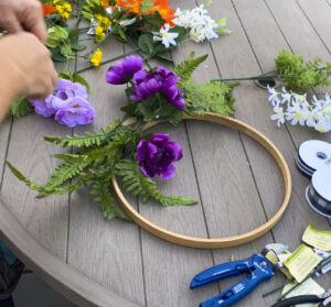thrift and dollar store diy spring wreath purple and orange