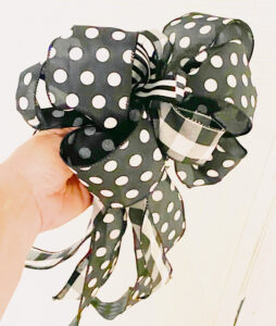 thrift and dollar store diy spring wreath black and white ribbon