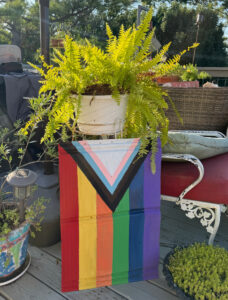 shopatblu barn metal pride flag on the deck