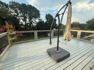 shopatblu faux rock planter re stained deck
